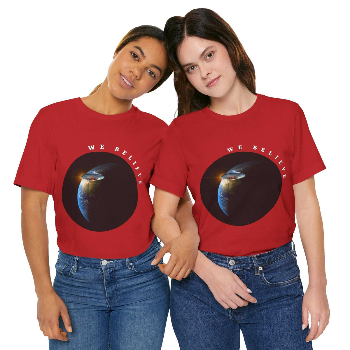 Out of This World unisex tee with UFO orbiting Earth and "We Believe" script design